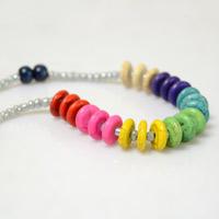 Making a Leather Necklace with Seed Beads and Rainbow Colored Turoqises