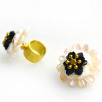 How to make clip on earrings decorated with vintage shell beads blooms in 2 steps