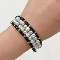 Instructions on Making a Black Leather Cord Bracelet with White Pearls and Rhinestones 