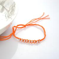 Simple Friendship Bracelet Tutorial on How to Braid Beads into a Bracelet with Strings