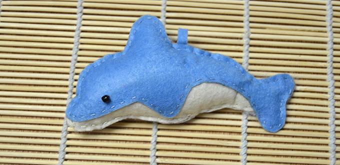 Simple Sewing Pattern for Making a Blue Stuffed Dolphin Pendant