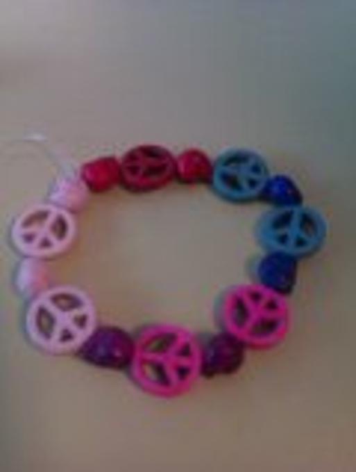 Bracelet skulls and peace made in workshop by Caitlin