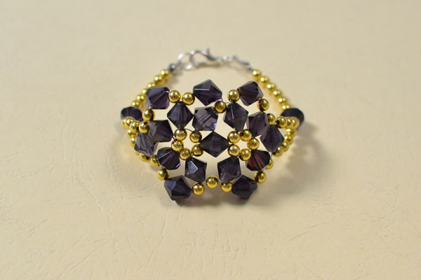 Look at this brilliant beaded jewelry craft! My purple glass beaded flower bracelet!