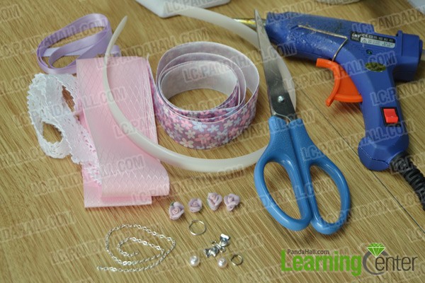 materials and tools for making purple ribbon bow headband