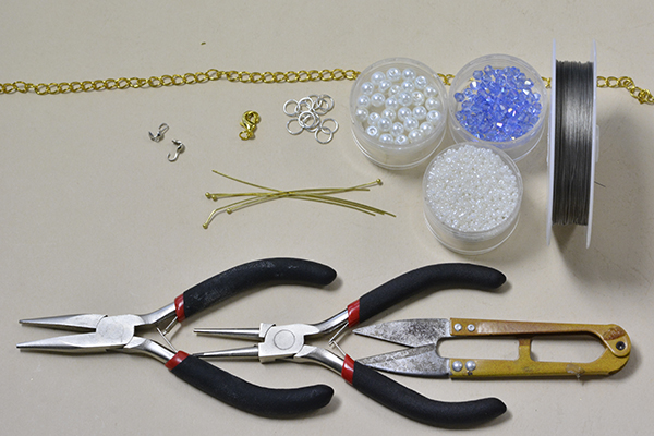Supplies in making the gold chain necklace with beaded tassels: