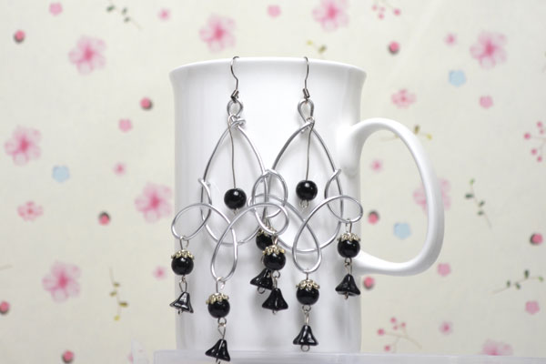the completed look of this pair of teardrop chandelier earrings