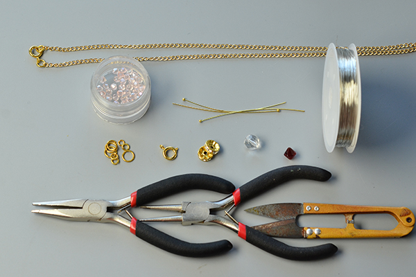 Tools and materials used to make this crown pendant necklace: