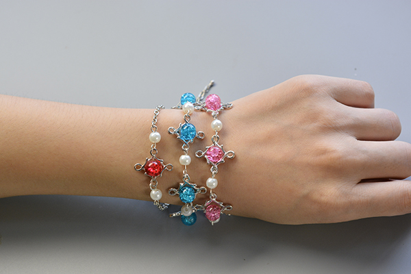 final look of the pink, blue and red glass bead and pearl bead chain bracelets