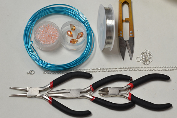 Materials and tools required in making the wire wrapped statement necklace: