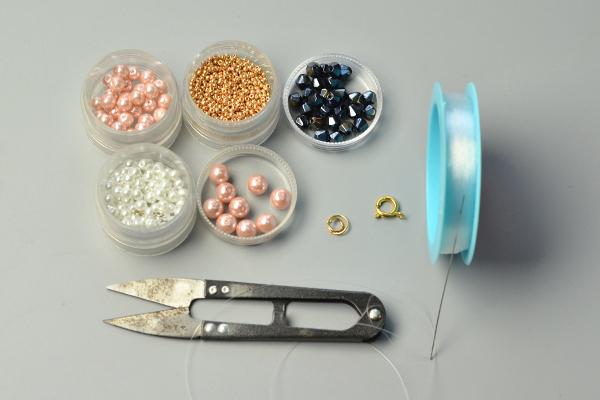 supplies needed in DIY the wide pink and white pearl bead bracelets