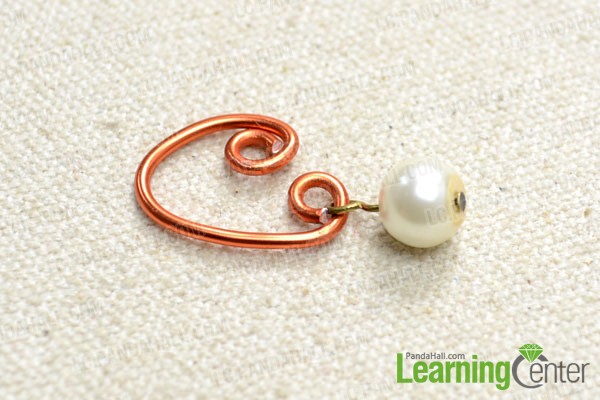 Connect the pearl dangle with heart element