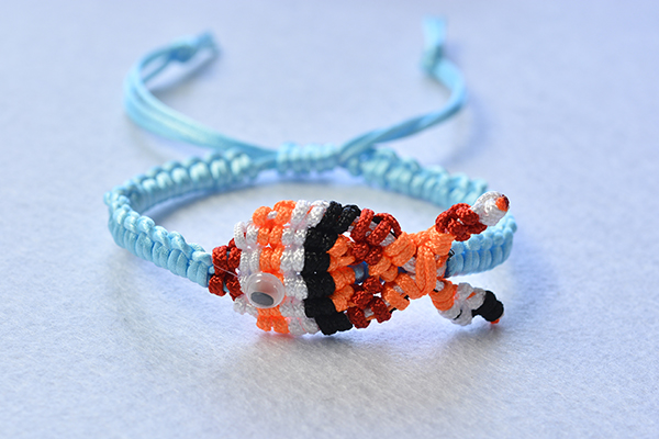 final look of the gold fish nylon thread braided friendship bracelet