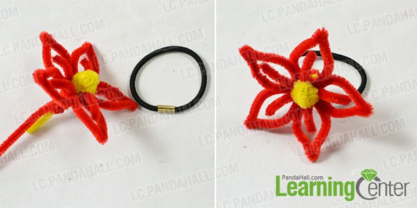 Wrap the red flower with a black hair tie 