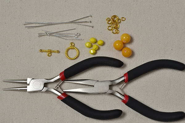 Supplies in making the yellow beaded 2-strand bracelet: