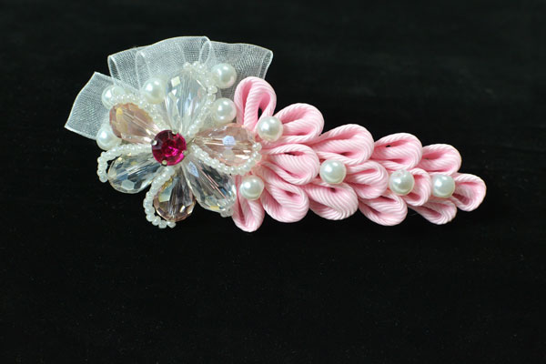 final look of the pink ribbon flower hair barrette