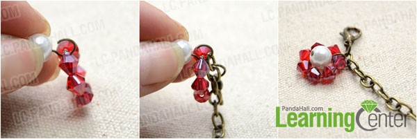 attach the red flower charm