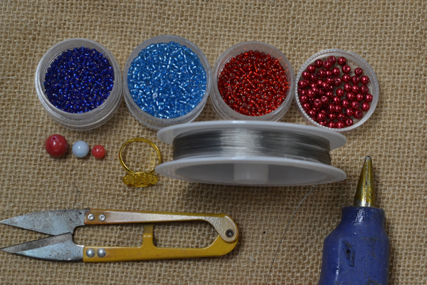 Materials and tools needed in DIY the stylish seed bead long ring: