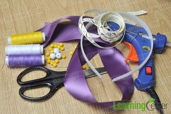 materials and tools for making a small ribbon flower headband