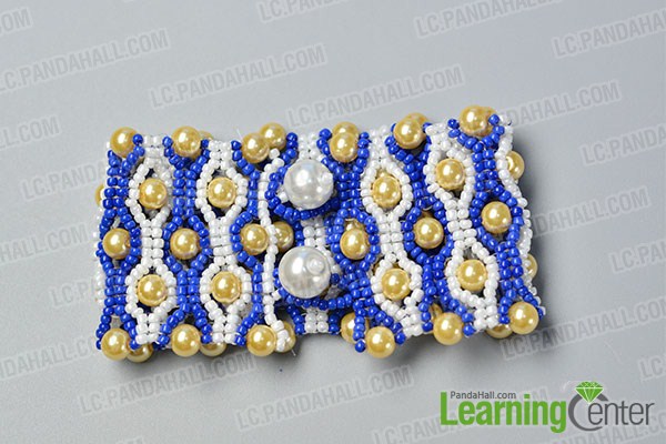 make the ninth part of the blue seed bead stitch wide bracelet