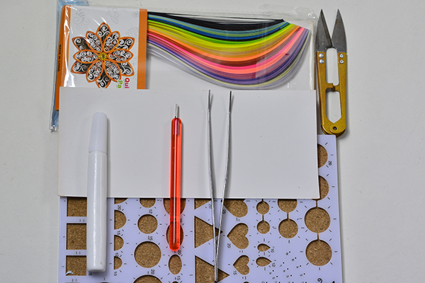 Supplies for this birthday cake card with quilling paper: