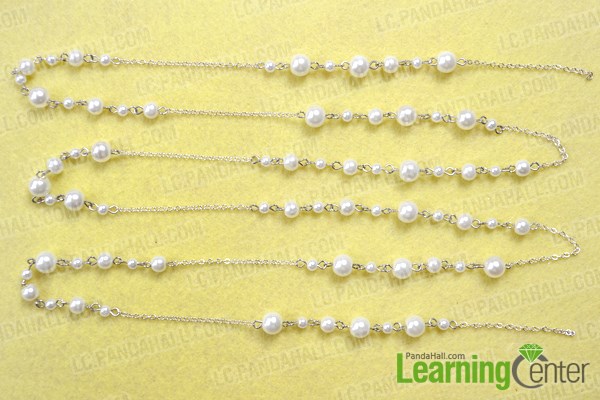 Finish the long layered pearl necklace with chain