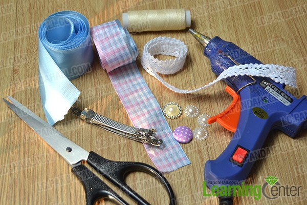 Materials and tools for making a homemade princess ribbon hair clip