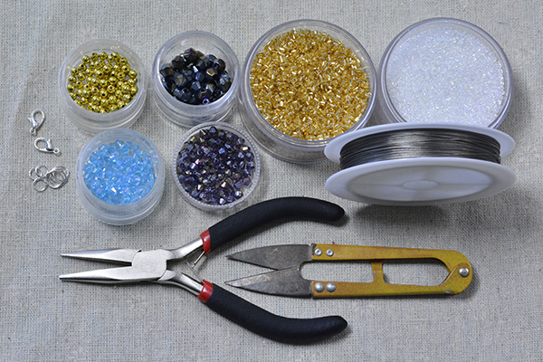 Supplies in making the glass beaded bracelet for summer: