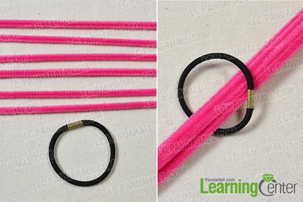 Prepare six red chenille stems and put them into a black rubber band.