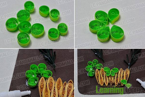 Add green quilling paper flowers
