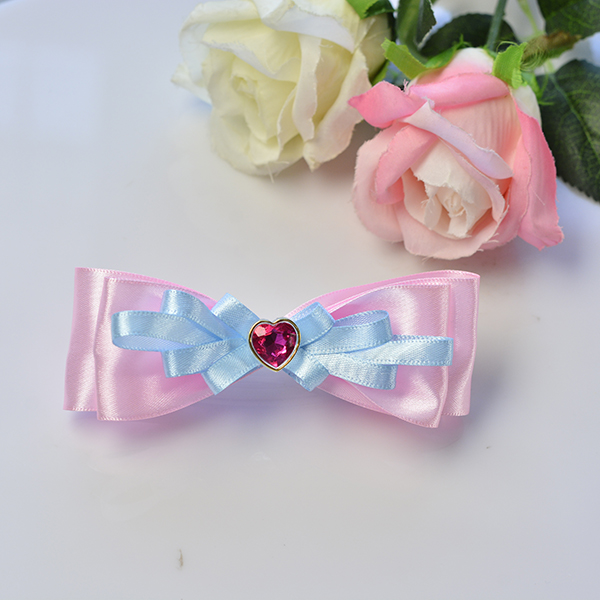 final look of the pink and blue ribbon bow hair clip with pink heart beads