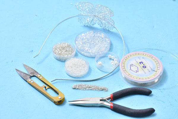 Supplies are needed for the white pearl wedding headband with glass and seed beads: