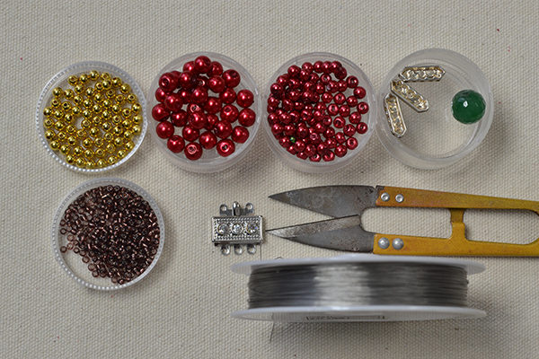 Materials needed in the red pearl statement bracelet DIY project:
