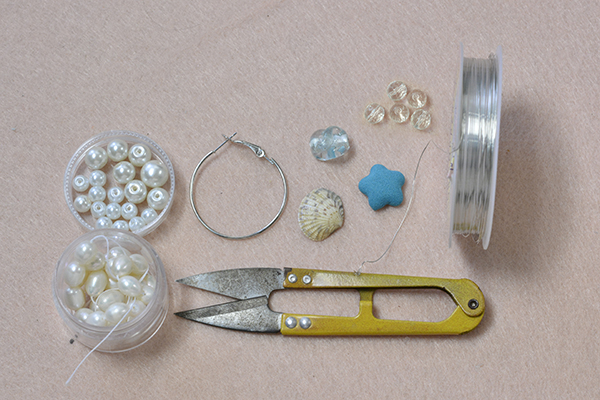 Supplies in making the ocean style shell and pearl hoop earrings: