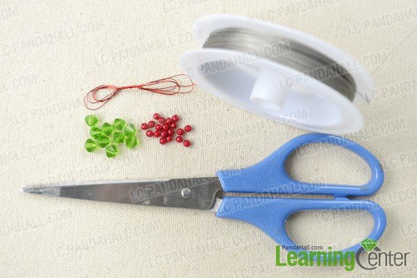 Materials in making beaded Christmas wreath decorations