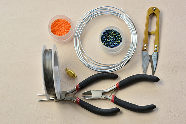 supplies needed in DIY the orange 2-hole seed bead bracelet