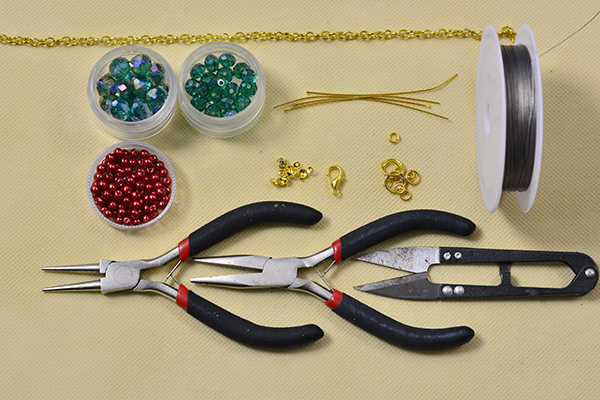 Supplies in making the gold chain and green glass beaded statement necklace: