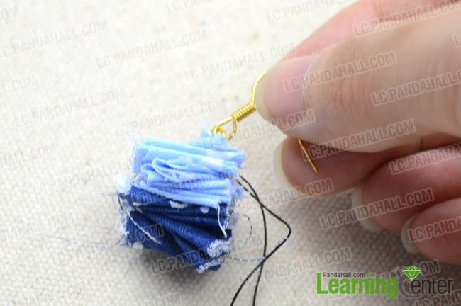 attach earring hook to the ruffled fabric 