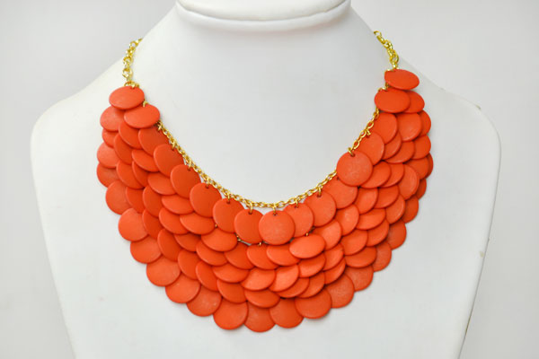 the final look of the fashion orange bib statement necklace