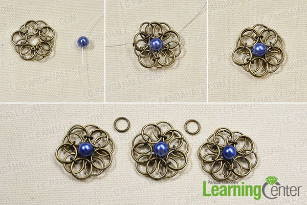 add blue pearl beads onto the middle of the flower chains