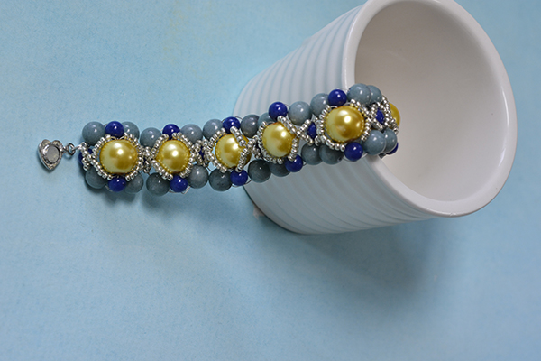 final look of the blue and yellow bracelet