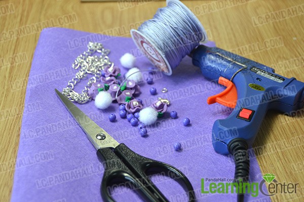 materials and tools for making a triple violet flowers chain necklace