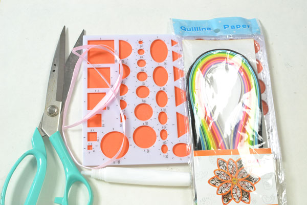 Supplies in making the 3D quilling paper cake craft for kids: