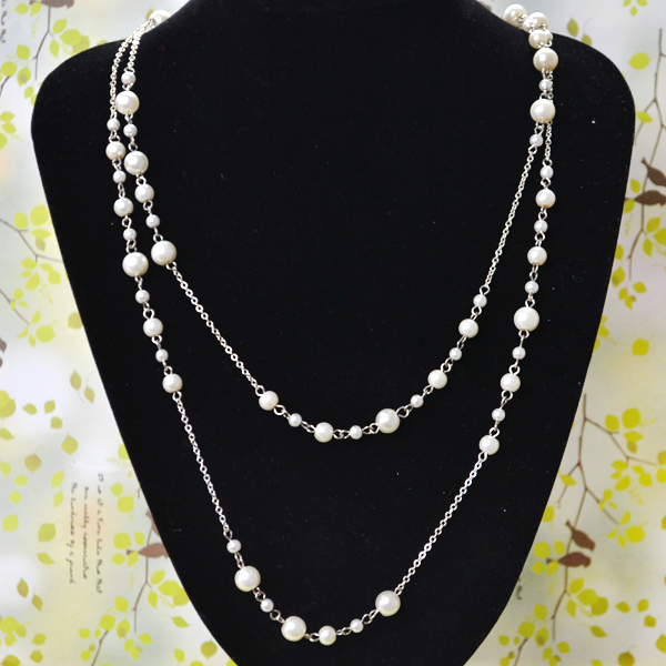 final look of the latest layered pearl necklace with chain design
