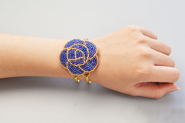 final look of the blue seed bead embroidery rose bangle bracelet. 
